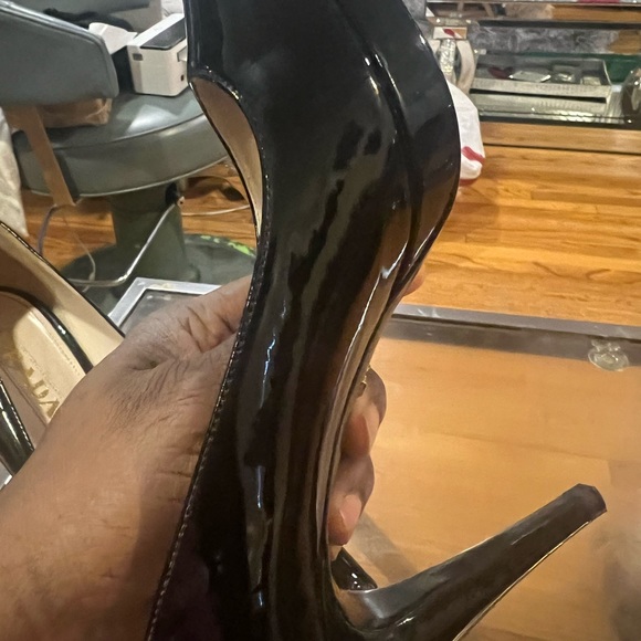I have a pair of Prada heels in like new condition - Picture 5 of 9